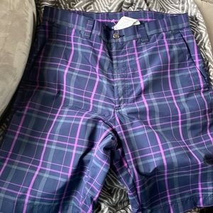 Mens Calloway shorts size 32.  Good condition navy/purple plaid golf shorts.